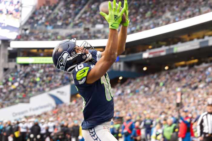 Seattle Seahawks wide receiver Tyler Lockett (16) catches a touchdown against the Carolina Panthers during the second quarter at Lumen Field.